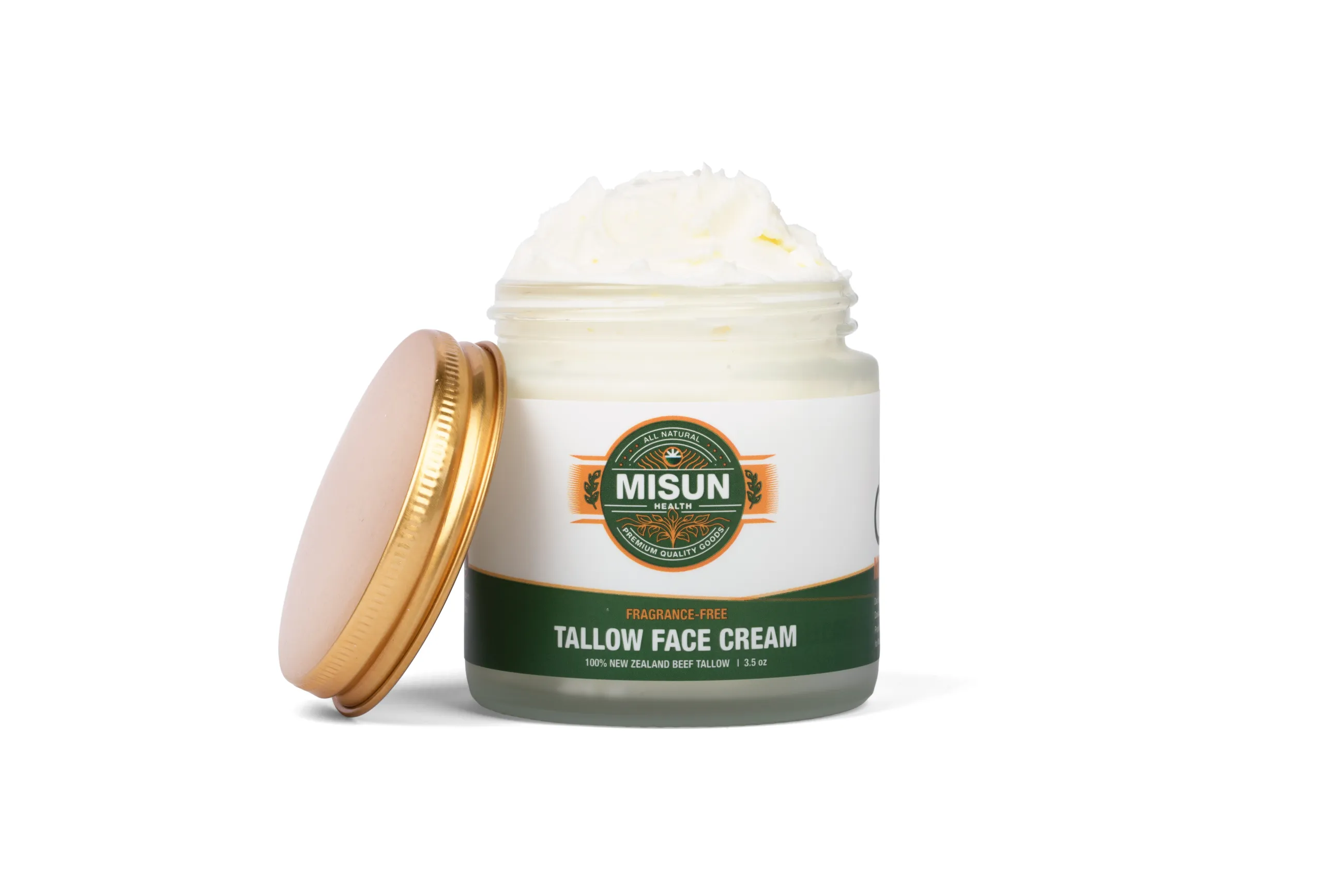 Open jar showing the texture of whipped tallow cream
